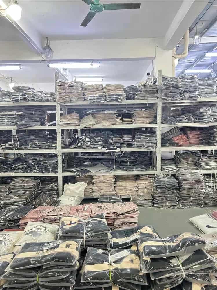stack of wholesale t-shirts bulk inventory